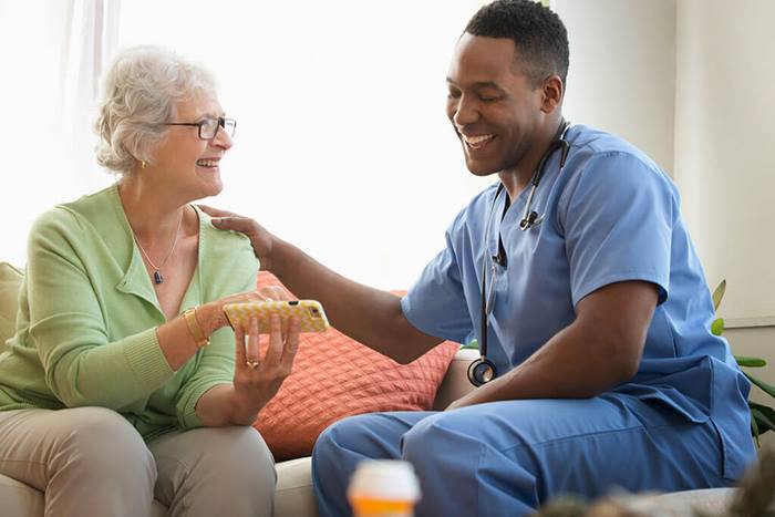 nurse and patient using cell phone